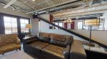 Open living room with loft style open ceilings